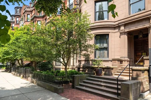 a bathroom with a sink and a window