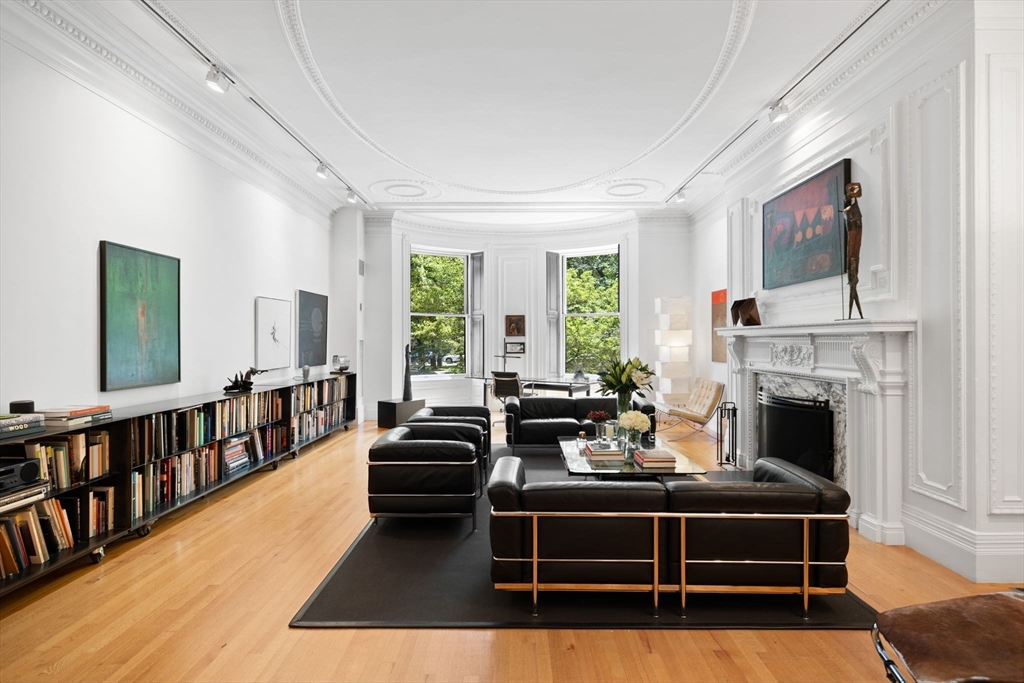 175 Commonwealth Avenue, Unit B Boston, MA 02116 - Photo 3 of 25 a living room with furniture fireplace and windows