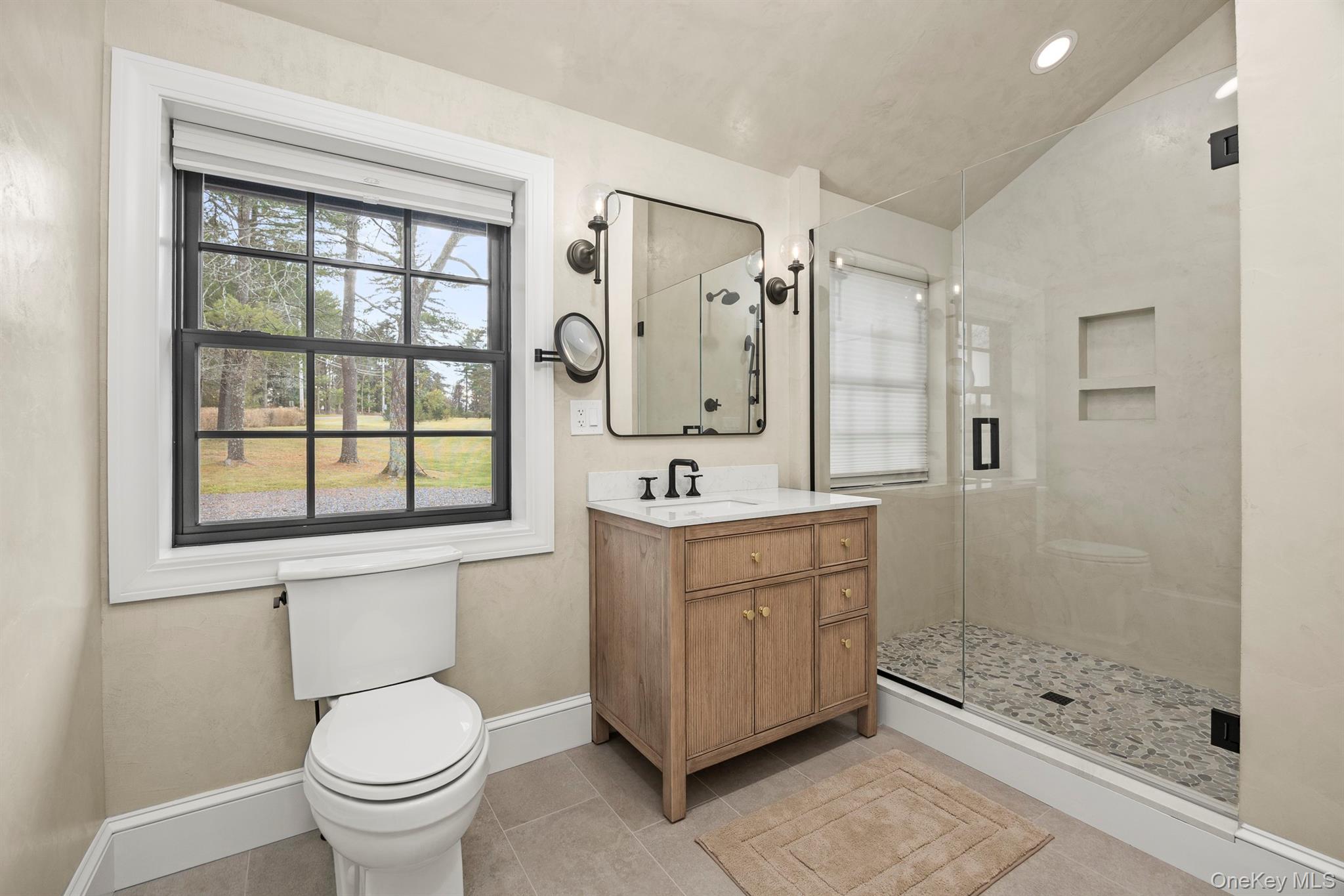 97 Valley Farm Road Millbrook, NY 12545 - Photo 21 of 48 a bathroom with a sink a toilet and shower