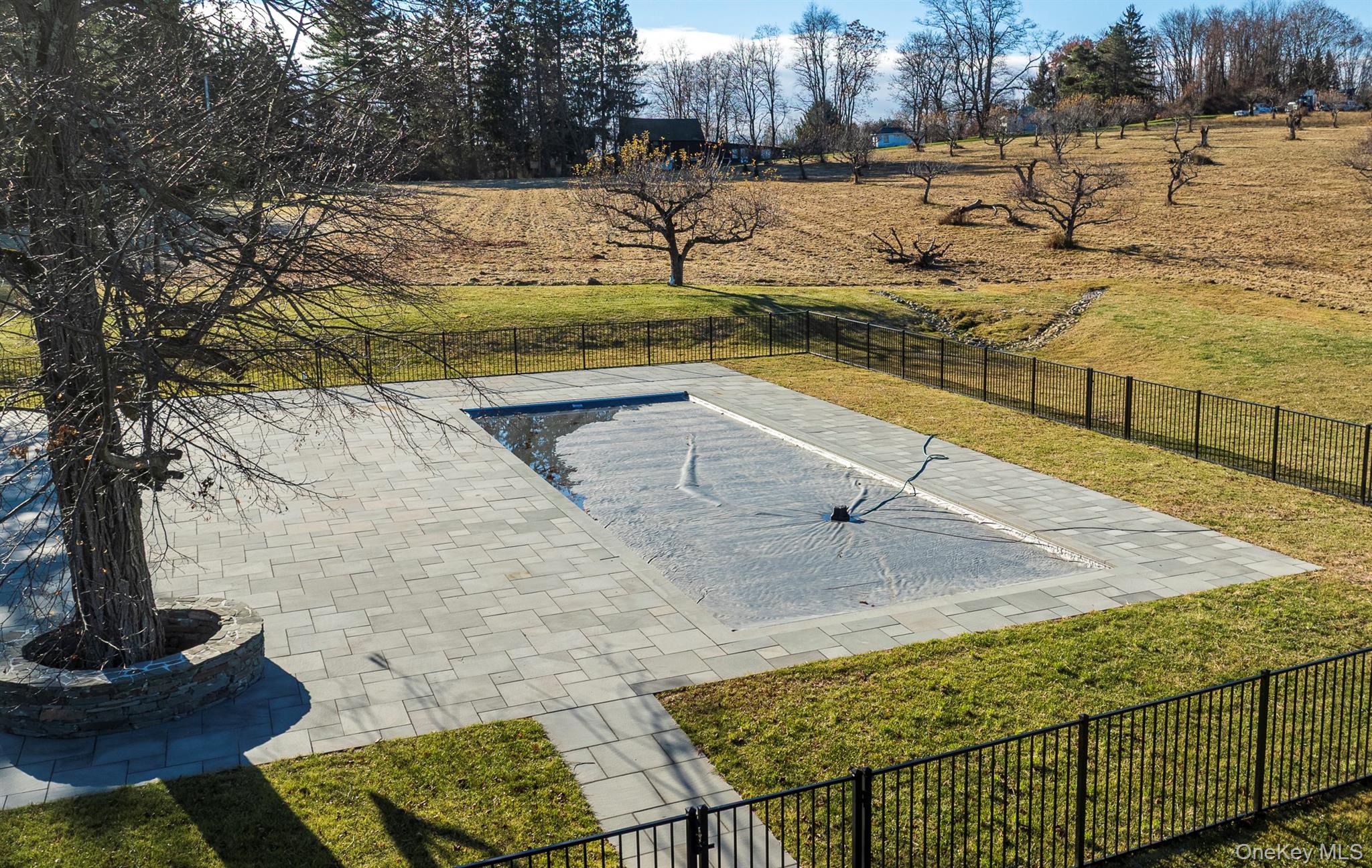 97 Valley Farm Road Millbrook, NY 12545 - Photo 34 of 49 a view of a swimming pool with a yard