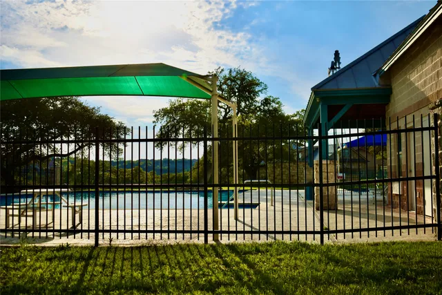 a picture of a building with yard