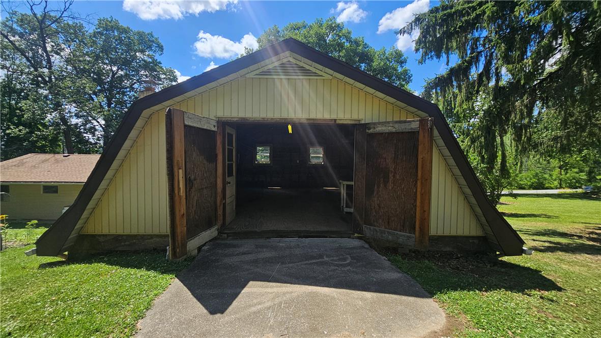 2529 Ringhoffer Road Hellertown, PA 18055 - Photo 28 of 33 A spacious barn, ready for storage or conversion, nestled in a verdant setting.