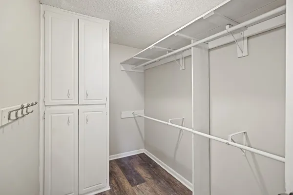 a view of an empty walk in closet