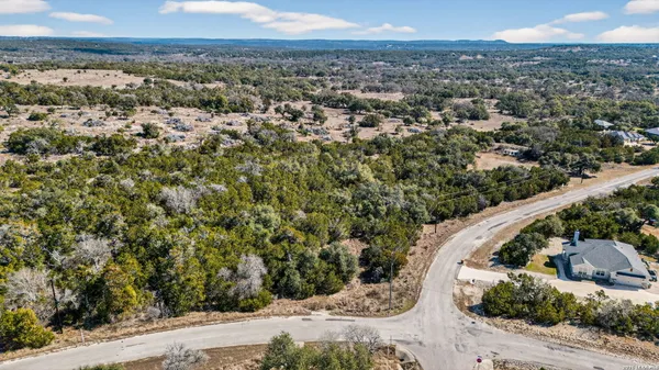 a view of a backyard with green space