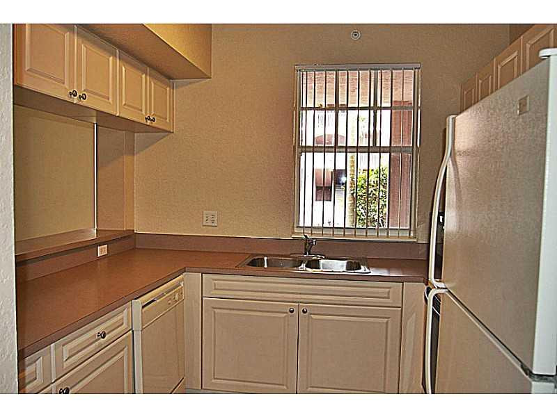 6678 West Sample Road, Unit B22 Coral Springs, FL 33067 - Photo 3 of 22 Kitchen