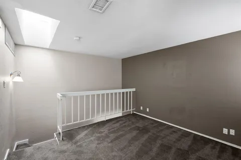 a view of a room with stairs