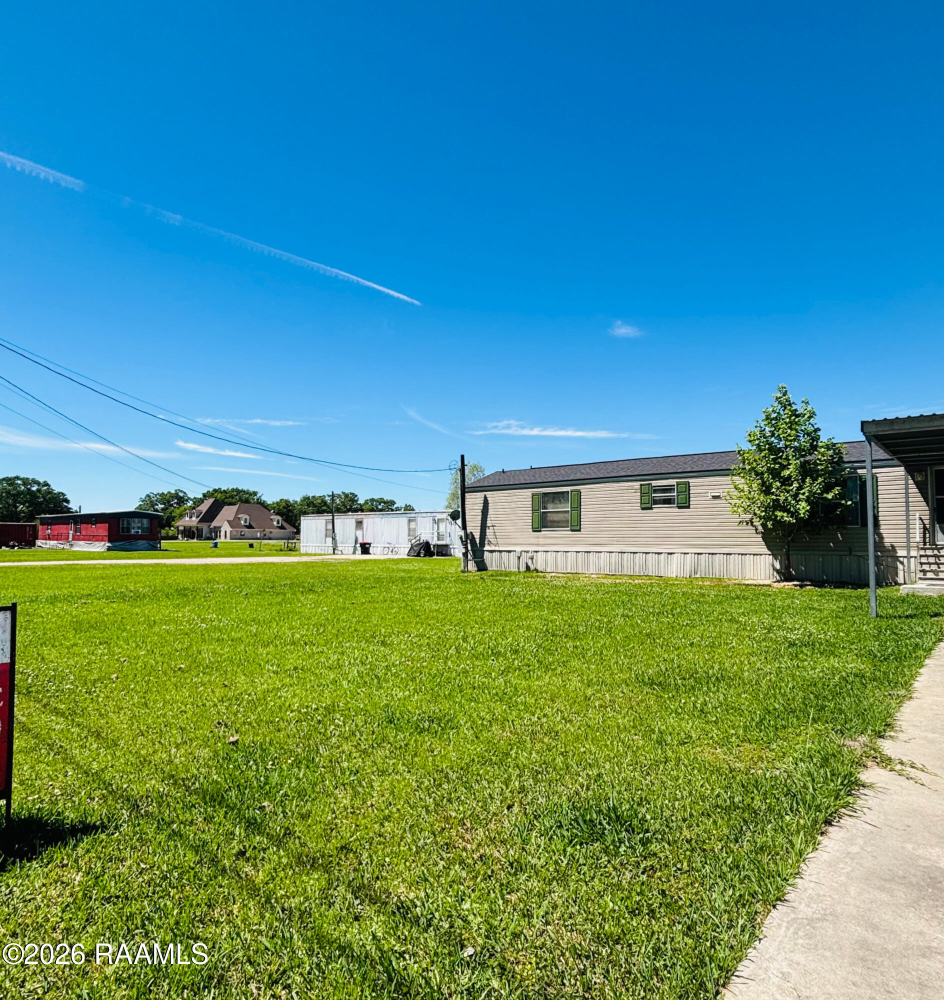 104 Gourmet Road Carencro, LA 70520 - Photo 4 of 13 Front left yard - Edited