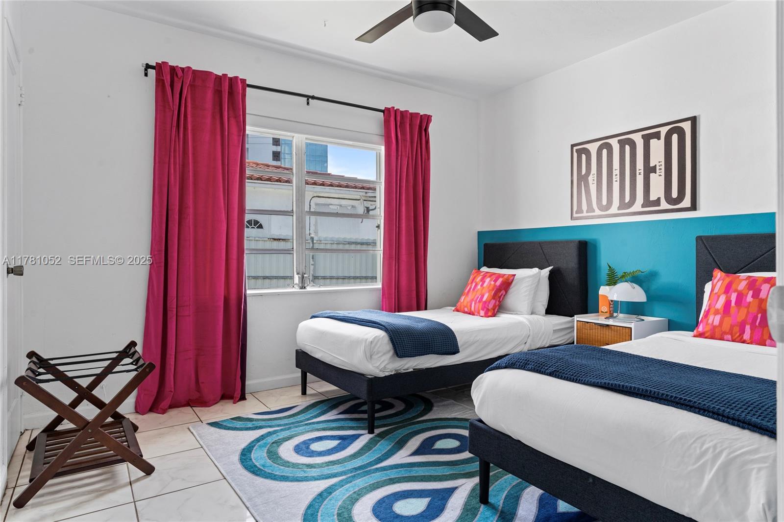 260 Northeast 45th Street Miami, FL 33137 - Photo 15 of 34 a living room with furniture and a window