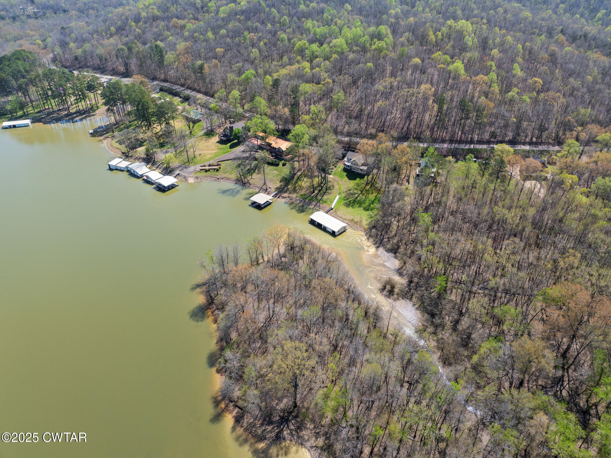 48 Old Pump Station Road Linden, TN 37096 - Photo 13 of 49 a view of a lake with a yard