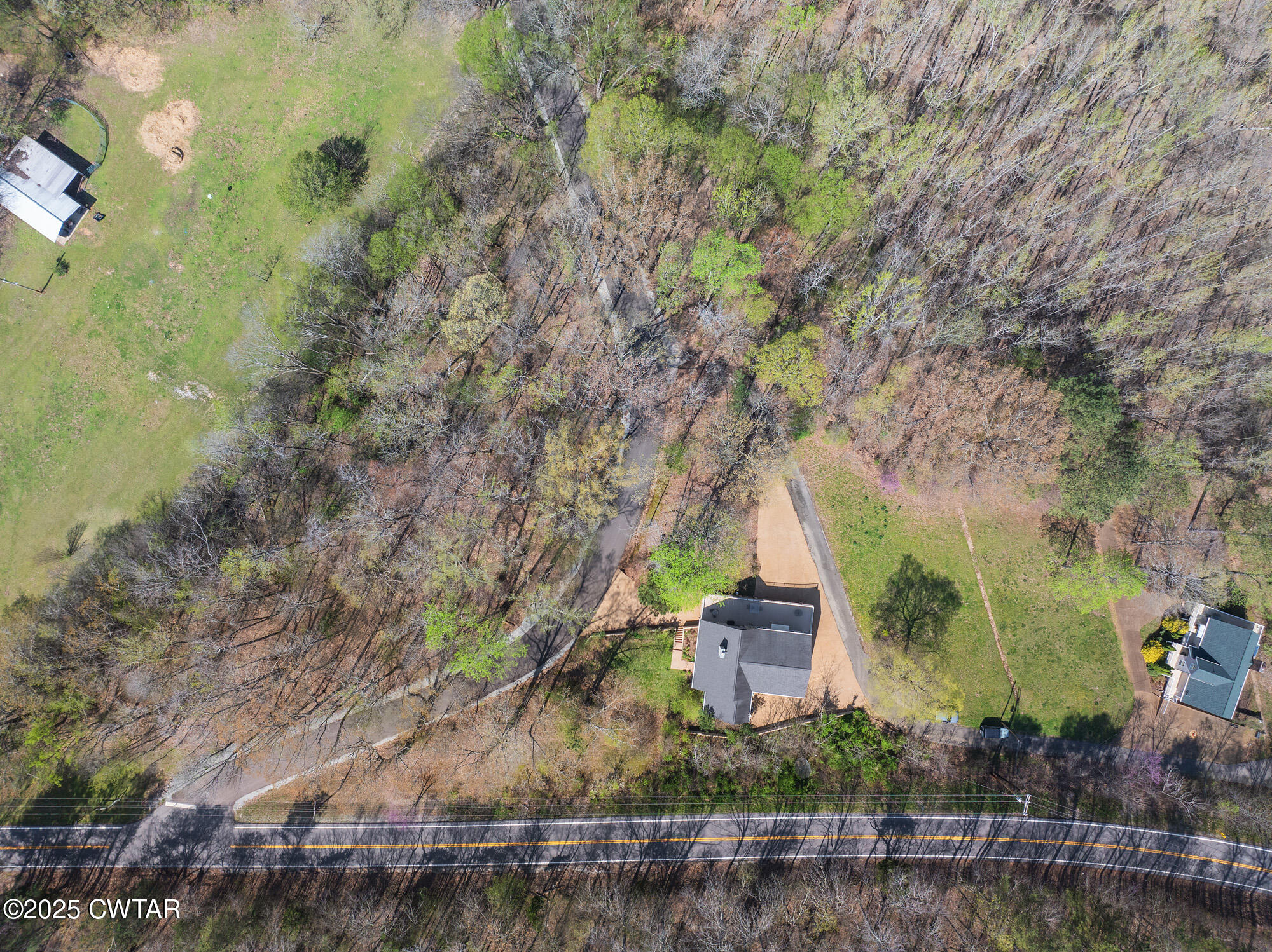 48 Old Pump Station Road Linden, TN 37096 - Photo 15 of 49 an aerial view of a house with a yard