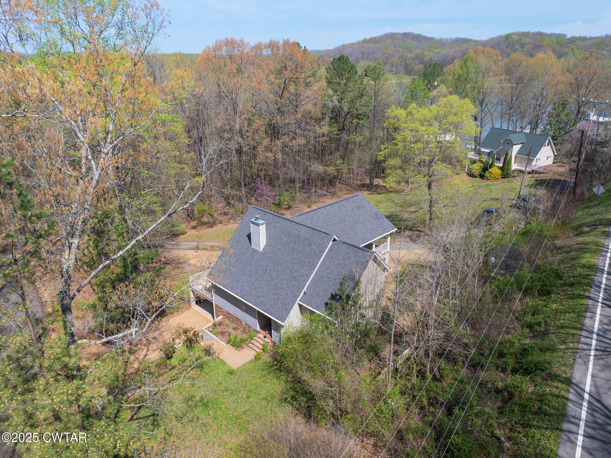 48 Old Pump Station Road Linden, TN 37096 - Photo 16 of 49 an aerial view of a house with mountain view