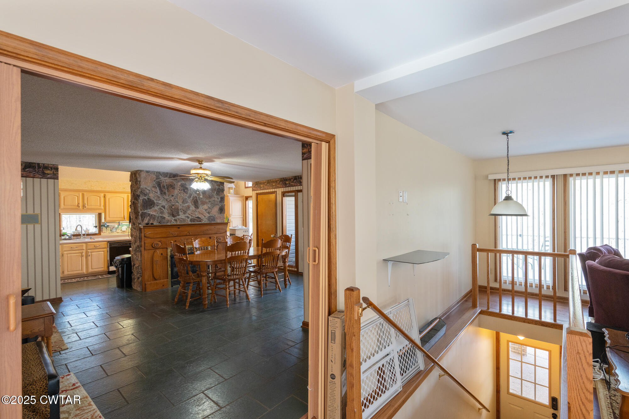 48 Old Pump Station Road Linden, TN 37096 - Photo 22 of 49 a dining room with furniture and a floor to ceiling window