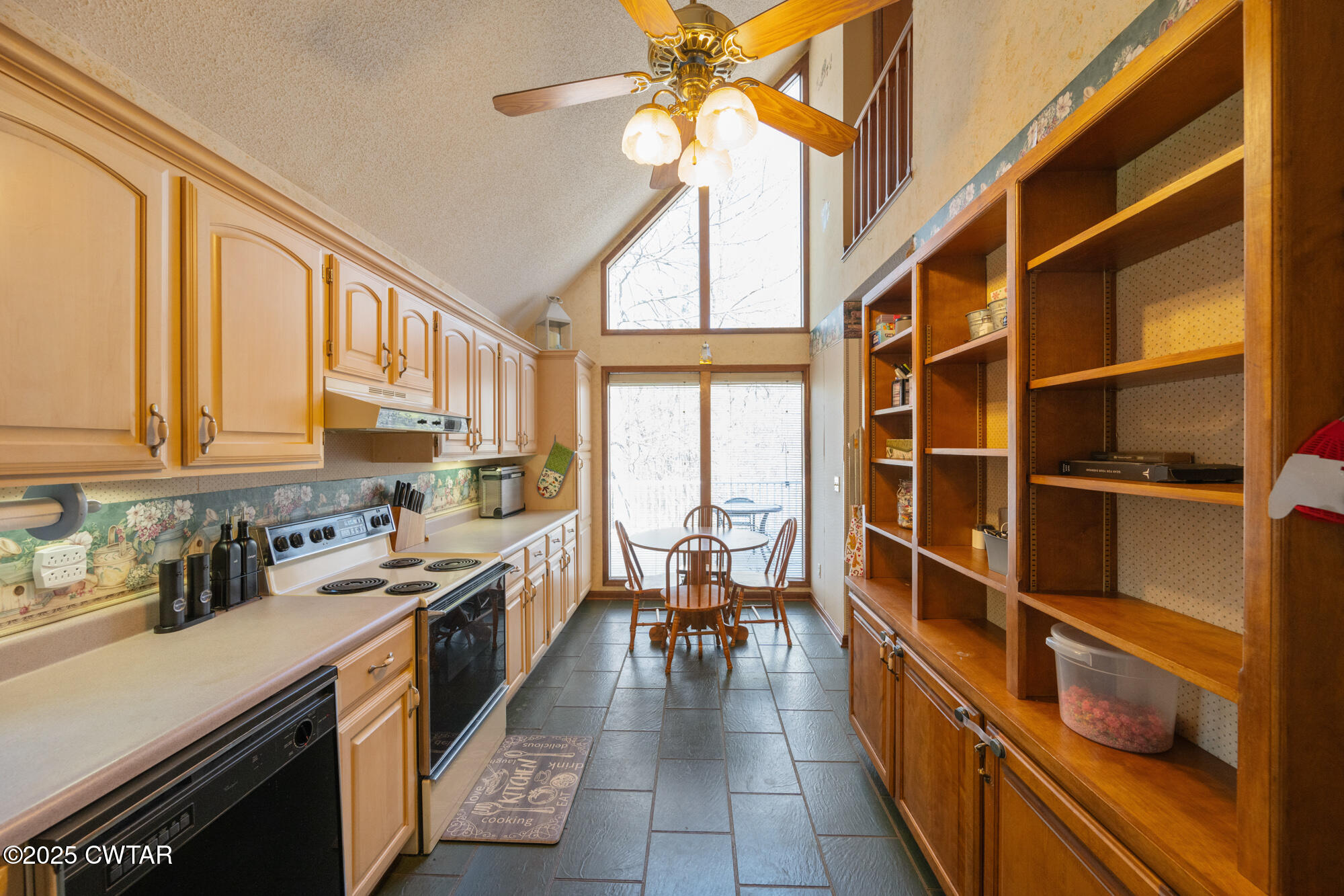 48 Old Pump Station Road Linden, TN 37096 - Photo 25 of 49 a view of a kitchen with kitchen island granite countertop a large window and a counter space