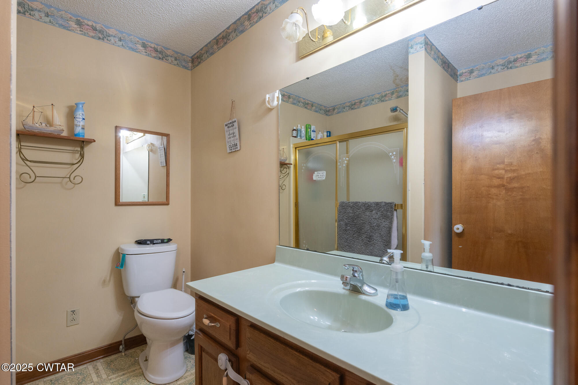 48 Old Pump Station Road Linden, TN 37096 - Photo 28 of 49 a bathroom with a sink toilet and shower