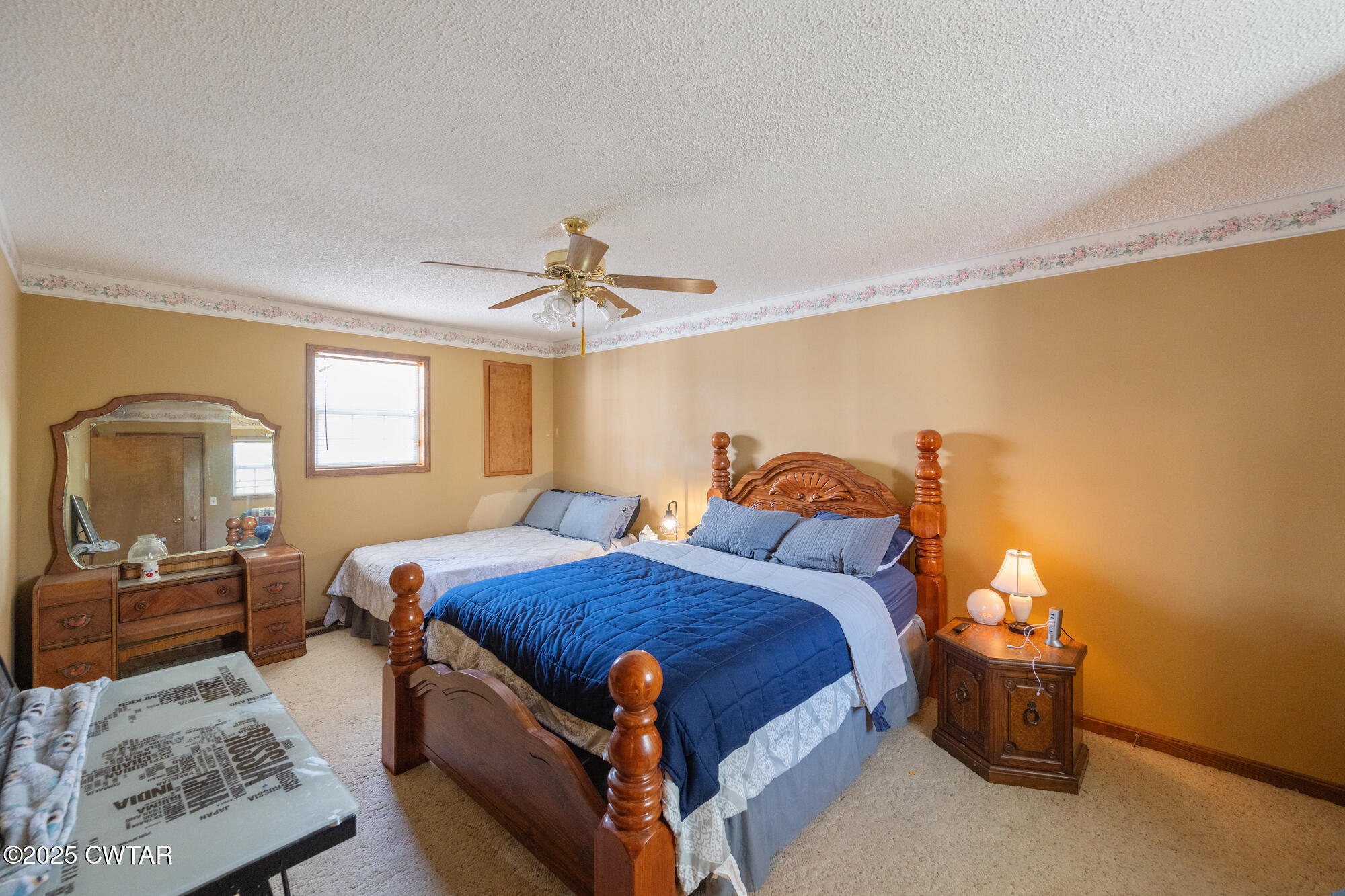 48 Old Pump Station Road Linden, TN 37096 - Photo 29 of 49 a bedroom with a bed and a mirror