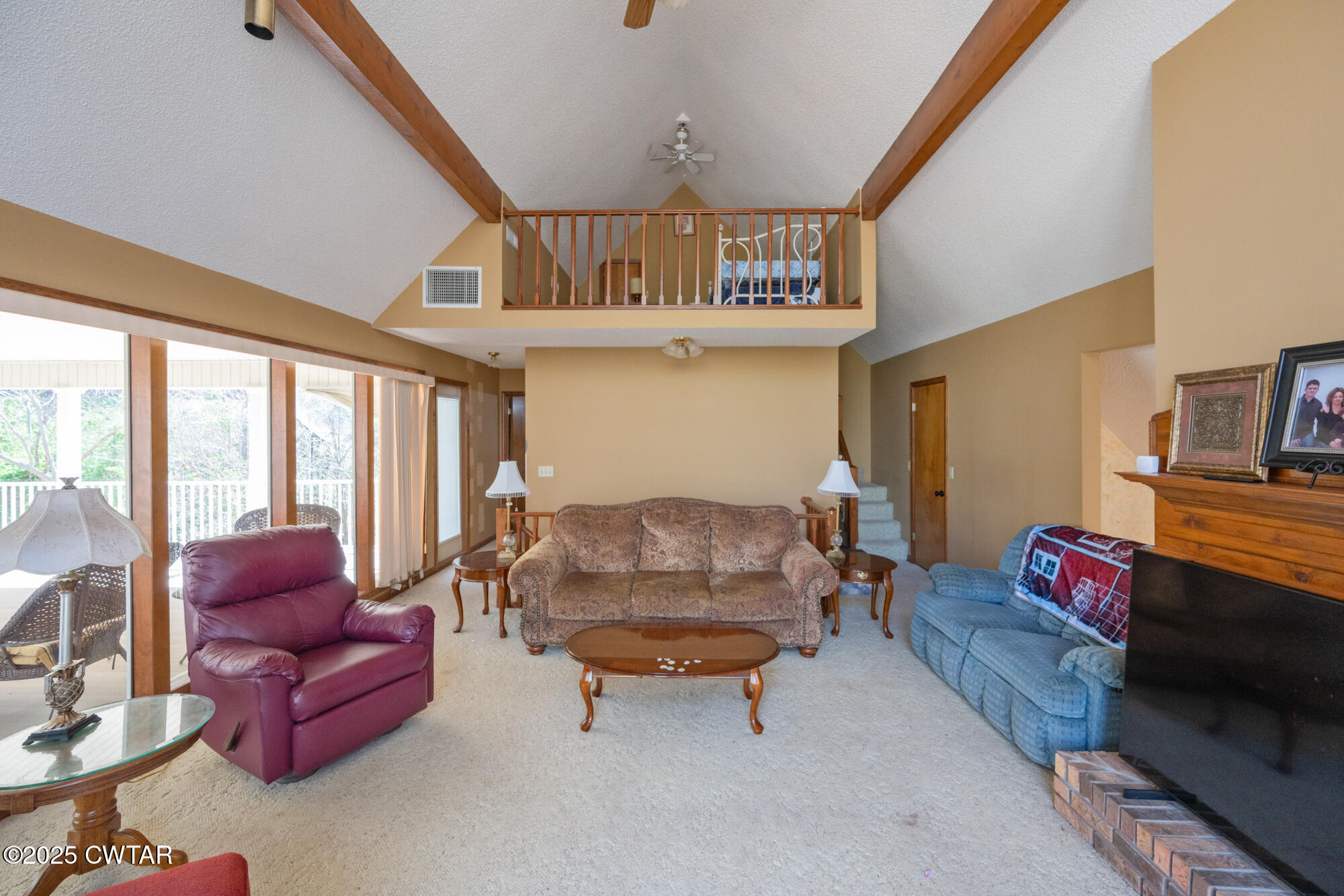 48 Old Pump Station Road Linden, TN 37096 - Photo 35 of 49 a living room with furniture and a flat screen tv
