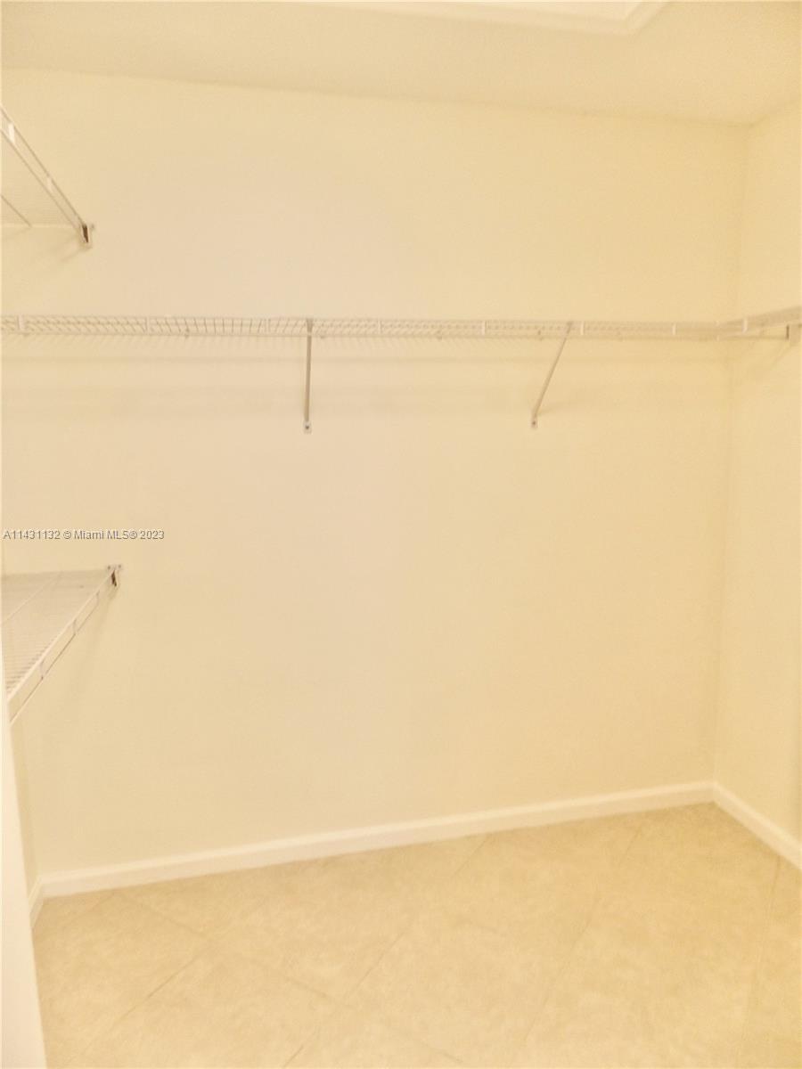 4744 Southwest 165th Avenue, Unit 4744 Miramar, FL 33027 - Photo 22 of 34 a close up of a shower