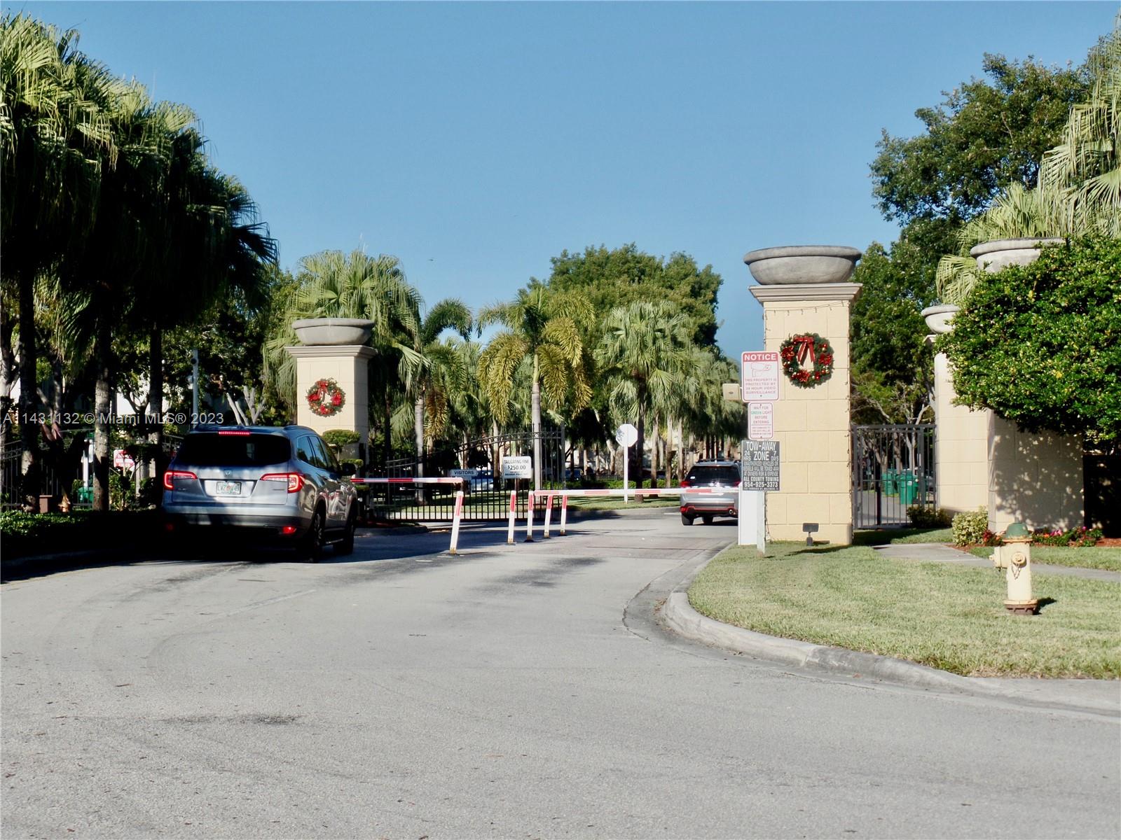 4744 Southwest 165th Avenue, Unit 4744 Miramar, FL 33027 - Photo 29 of 34 a view of a cars park in front of a building