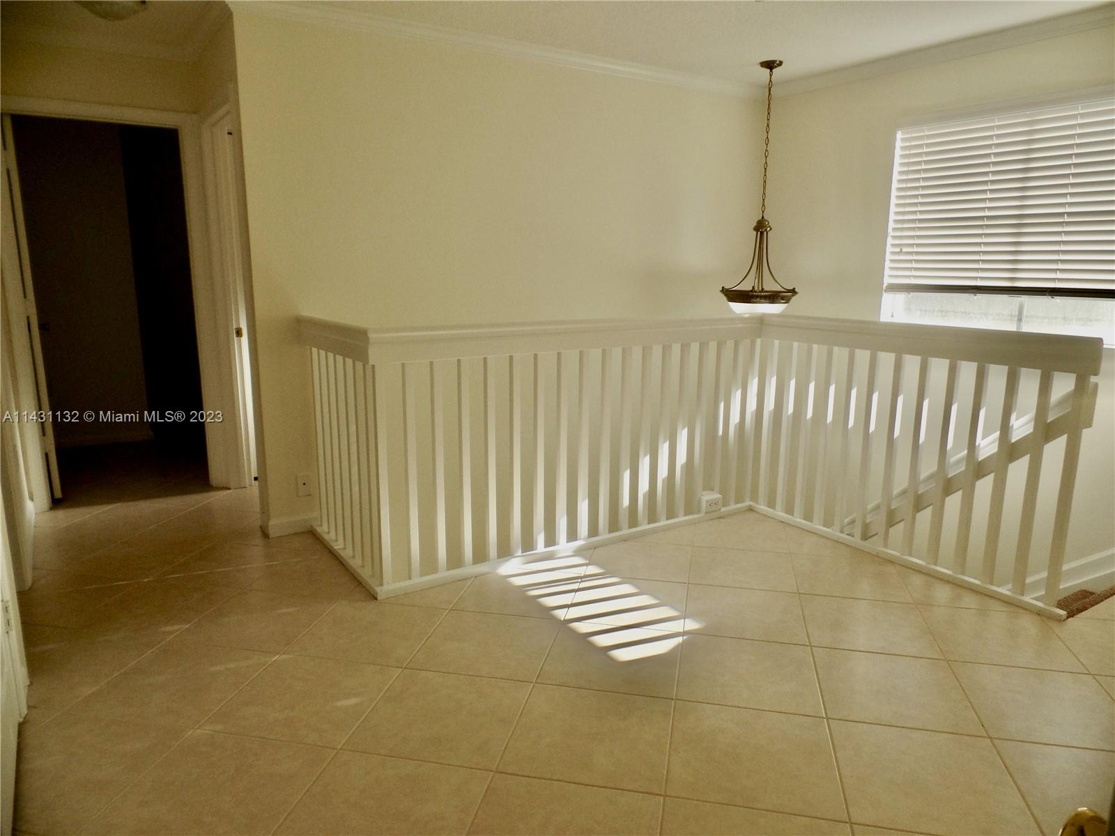 4744 Southwest 165th Avenue, Unit 4744 Miramar, FL 33027 - Photo 9 of 34 a view of an empty room