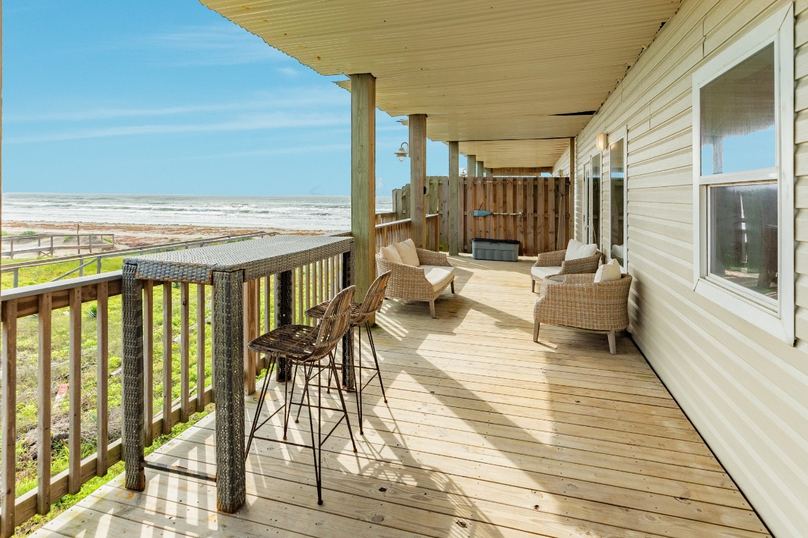 116 Howard Avenue, Unit G Surfside Beach, TX 77541 - Photo 21 of 31 a view of balcony with chairs