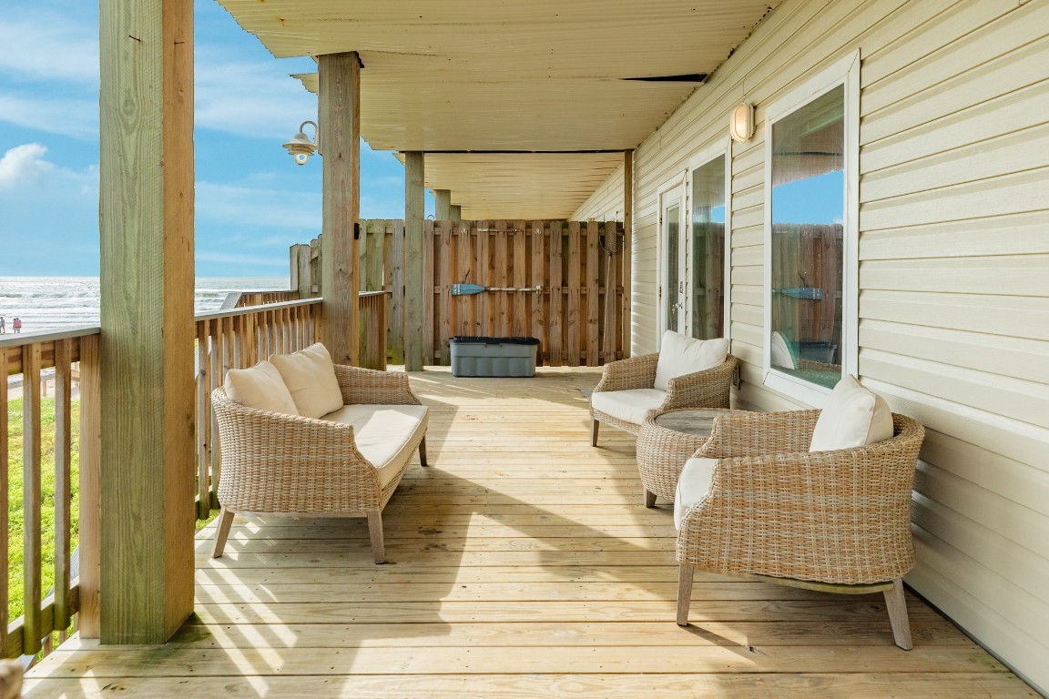 116 Howard Avenue, Unit G Surfside Beach, TX 77541 - Photo 22 of 31 a view of balcony with patio