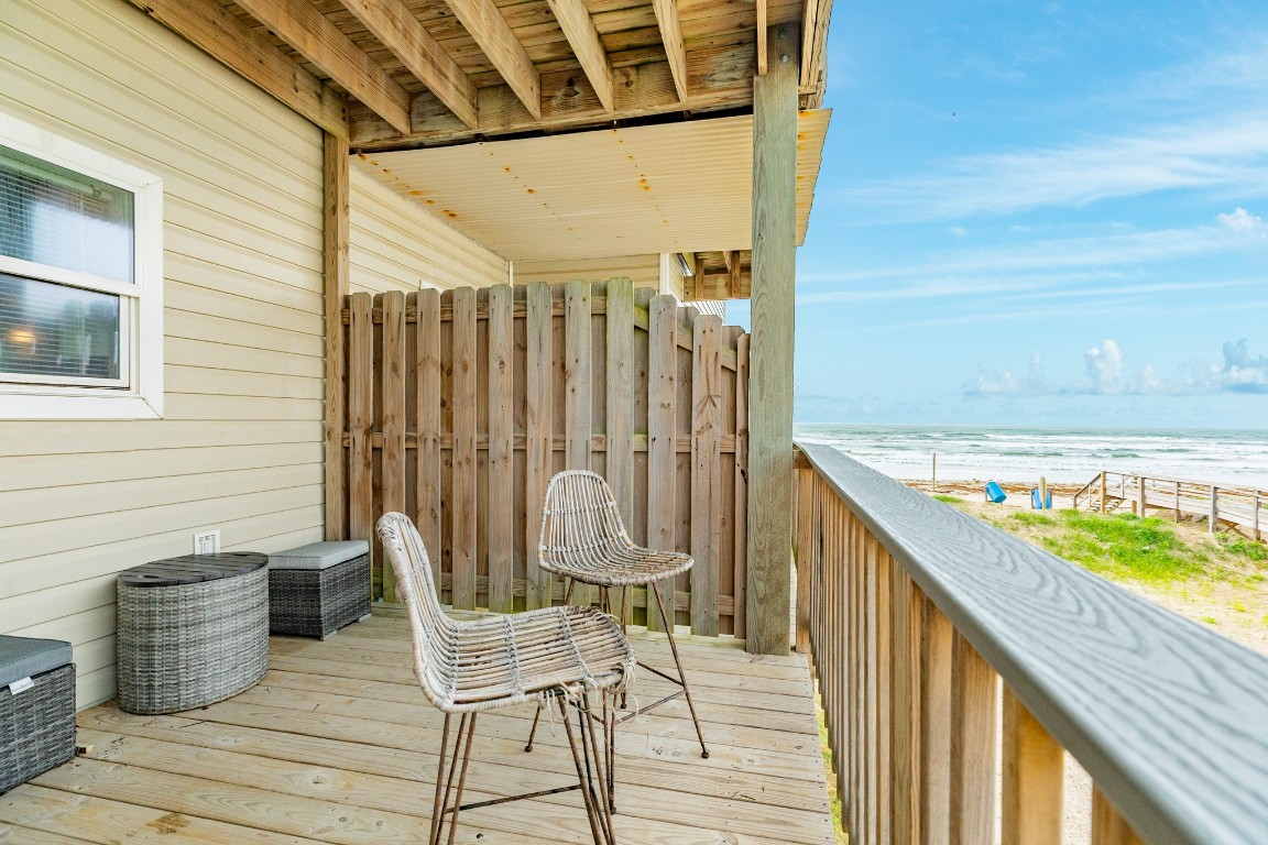 116 Howard Avenue, Unit G Surfside Beach, TX 77541 - Photo 23 of 31 a view of a chairs on the roof deck