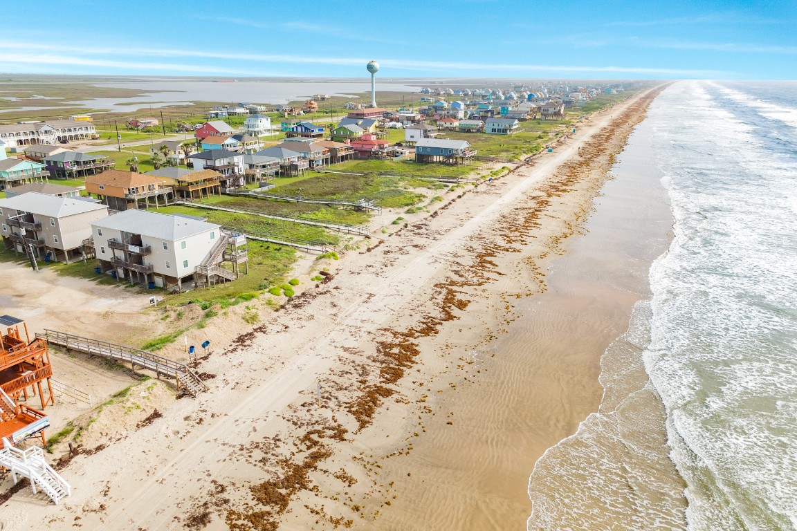 116 Howard Avenue, Unit G Surfside Beach, TX 77541 - Photo 24 of 31 a view of an ocean and beach