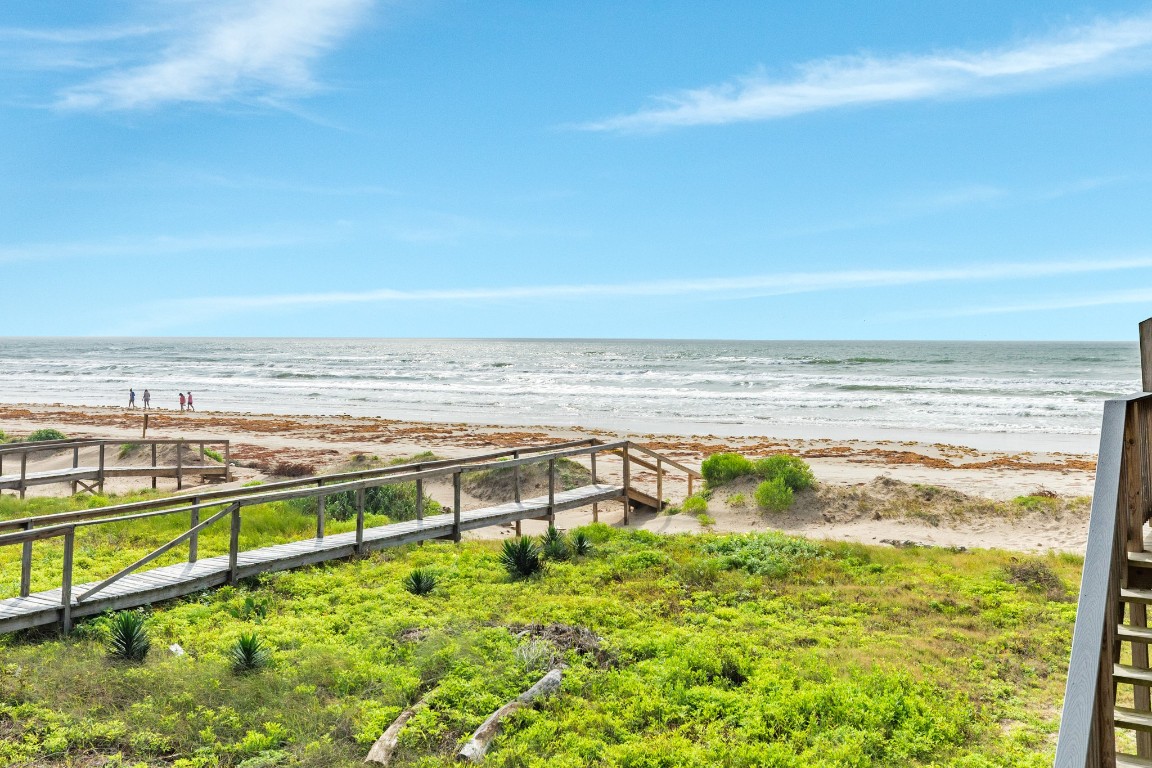116 Howard Avenue, Unit G Surfside Beach, TX 77541 - Photo 25 of 31 a view of an ocean and beach