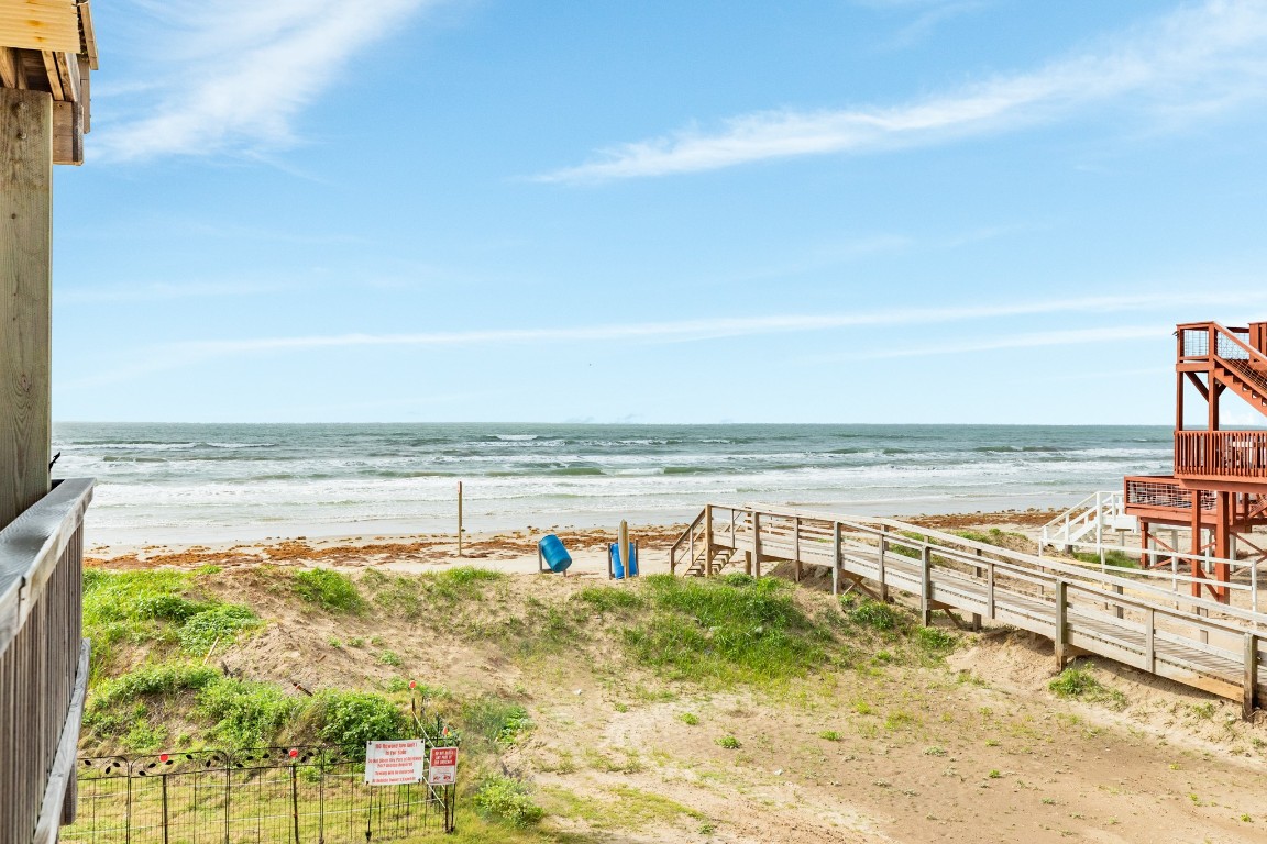 116 Howard Avenue, Unit G Surfside Beach, TX 77541 - Photo 27 of 31 a view of an ocean and beach