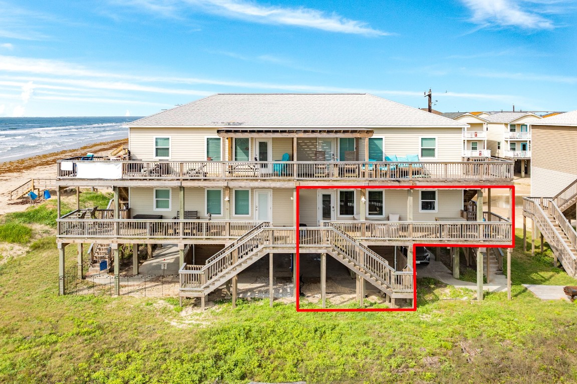 116 Howard Avenue, Unit G Surfside Beach, TX 77541 - Photo 30 of 31 a view of a house with roof deck and seating space