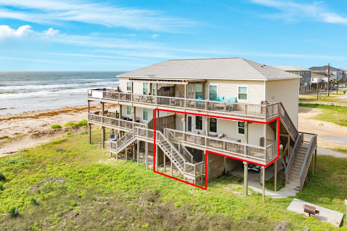 116 Howard Avenue, Unit G Surfside Beach, TX 77541 - Photo 31 of 31 an aerial view of a house with a backyard