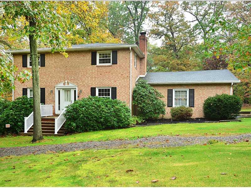 208 Woodcroft Road Economy, PA 15005 - Photo 1 of 15 Exterior Front. All brick exterior with a gravel governors drive.