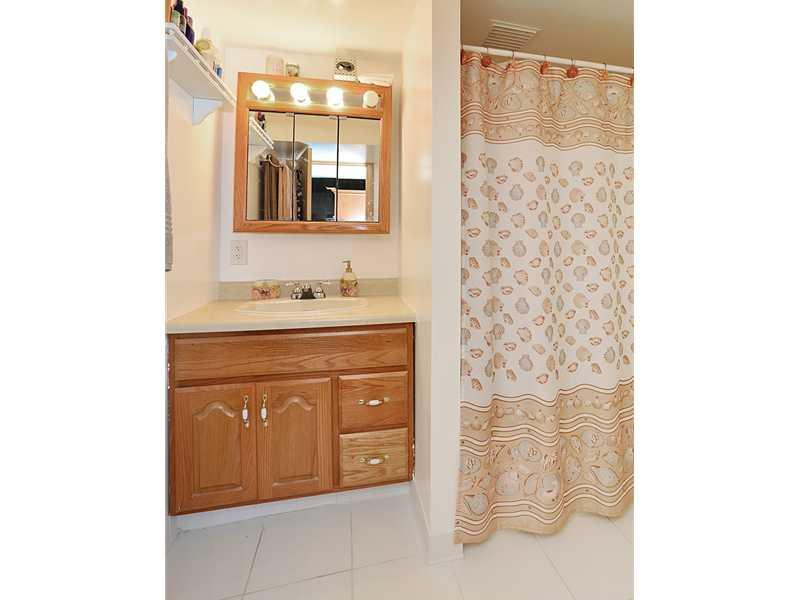 208 Woodcroft Road Economy, PA 15005 - Photo 12 of 15 Full Bath. The finished lower level has a full bath with a spa tub and full single bowl vanity.
