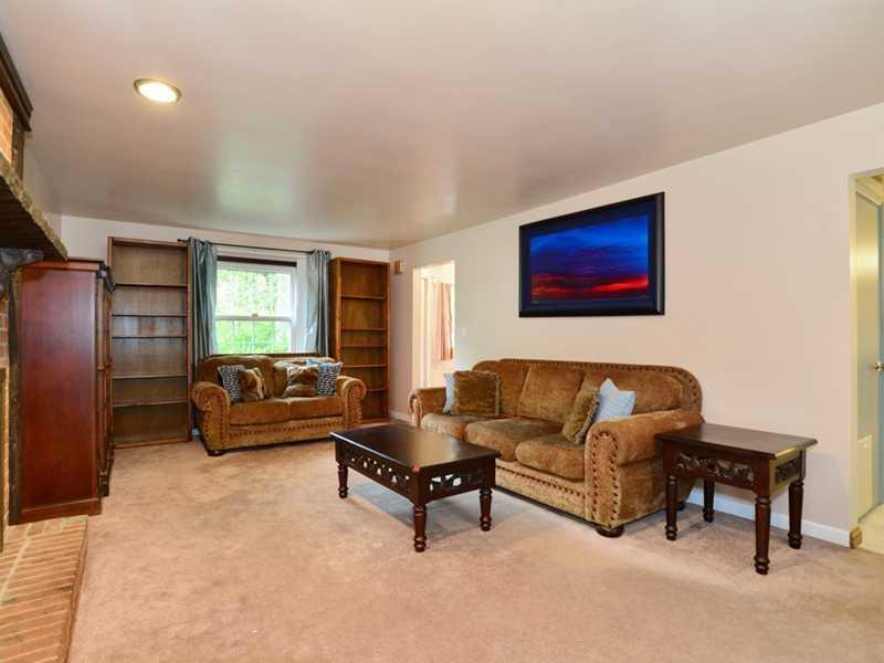 208 Woodcroft Road Economy, PA 15005 - Photo 5 of 15 Family Room. The family room is adjacent to the entry and the kitchen.