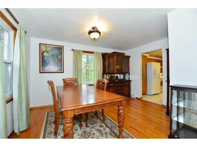 208 Woodcroft Road Economy, PA 15005 - Photo 6 of 15 Dining Room. The formal dining room has hardwood floors and leads directly to the kitchen
