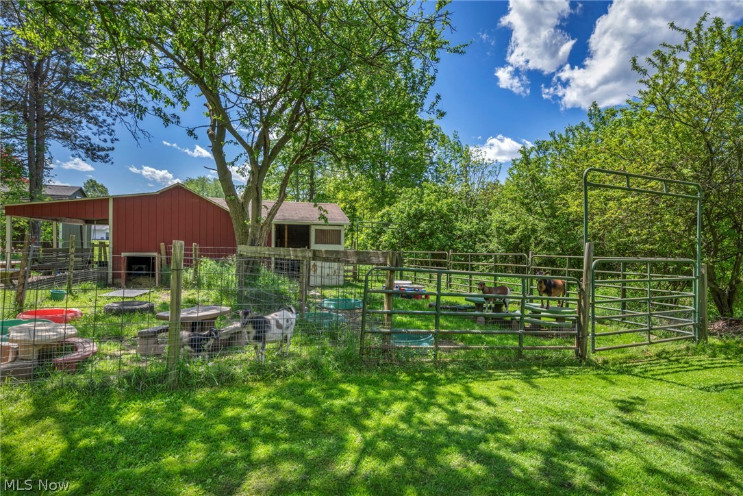 6144 Ridge Road Wadsworth, OH 44281 - Photo 41 of 48 View of yard with an outdoor structure