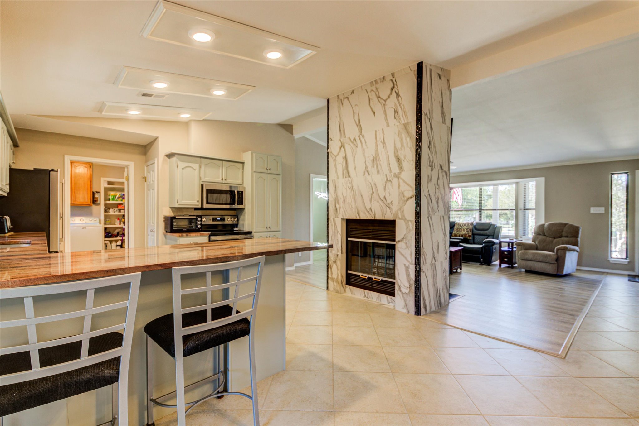 200 Harbor Circle Georgetown, TX 78633 - Photo 8 of 38 a large white kitchen with a large window