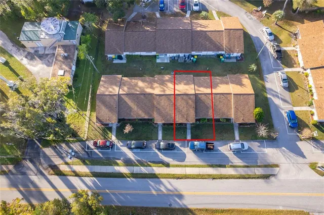 a view of swimming pool with outdoor seating and a patio