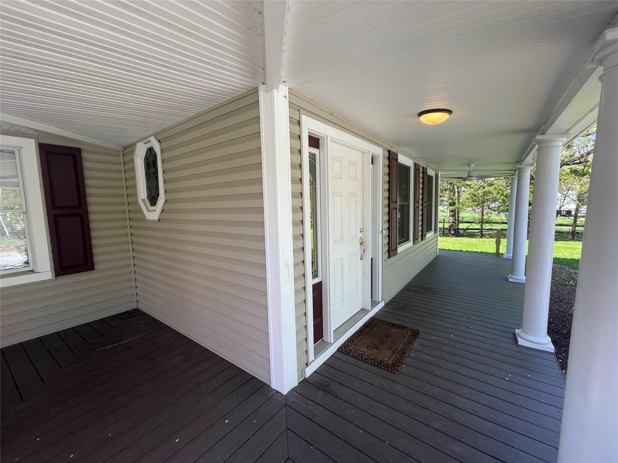 496 North Country Road St. James, NY 11780 - Photo 3 of 17 a view of hallway with wooden floor