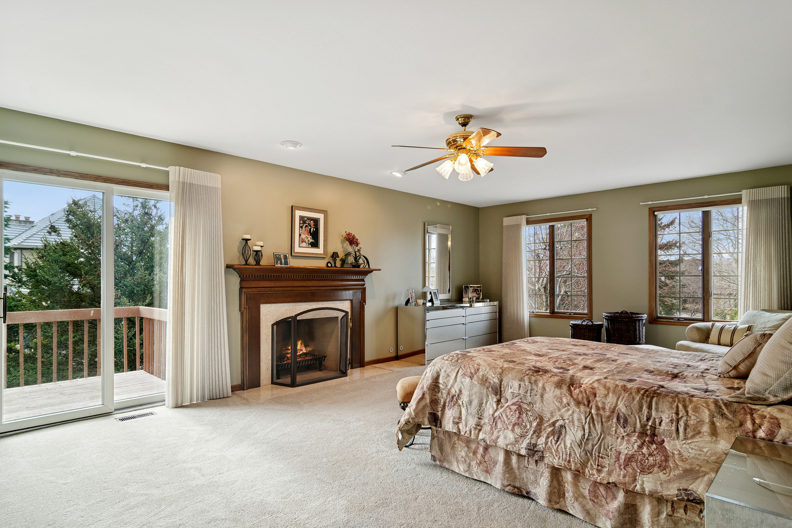 1515 Galloway Drive Inverness, IL 60010 - Photo 24 of 60 a bedroom with a bed and a fireplace