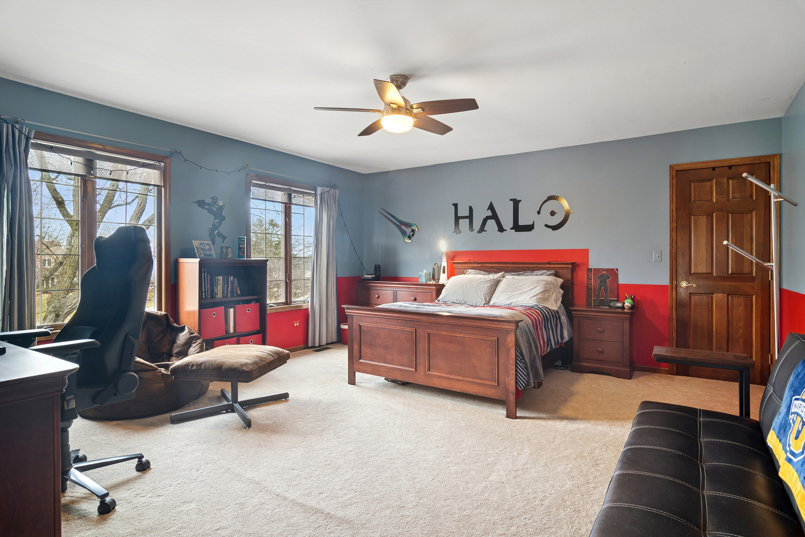 1515 Galloway Drive Inverness, IL 60010 - Photo 28 of 60 a bedroom with a bed and a chandelier