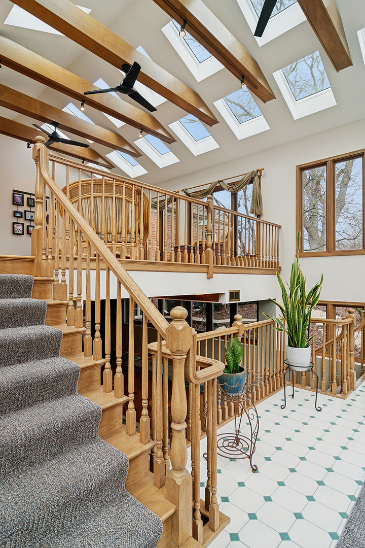 1515 Galloway Drive Inverness, IL 60010 - Photo 34 of 60 a view of a dining room with furniture a chandelier and wooden floor