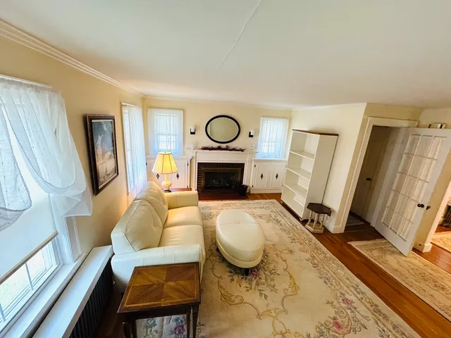 a workspace with furniture and wooden floor