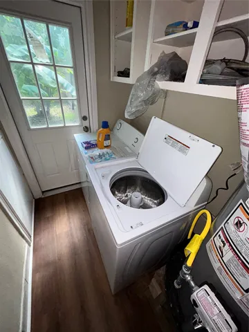 a view of kitchen and washer dryer