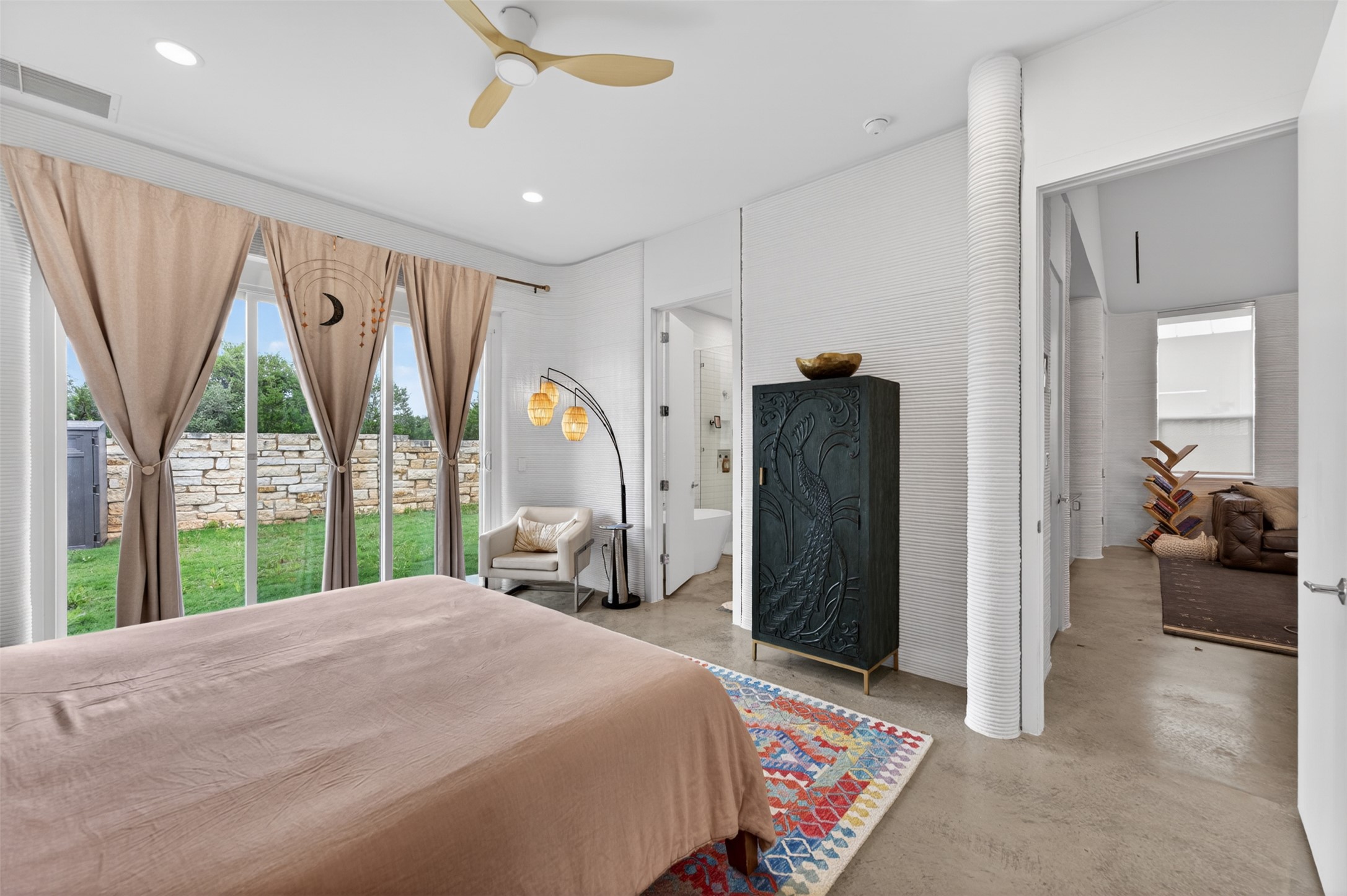 308 Painted Sunset Drive Georgetown, TX 78628 - Photo 22 of 26 Expansive window wall with direct outdoor access