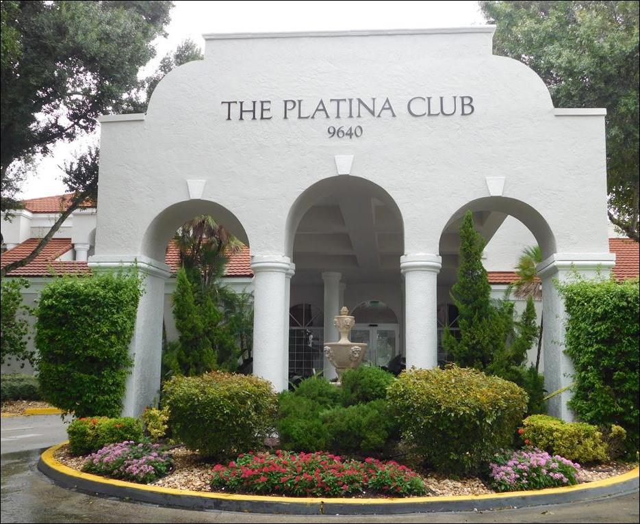 5203 Europa Drive, Unit G Boynton Beach, FL 33437 - Photo 19 of 29 a front view of house with yard and green space