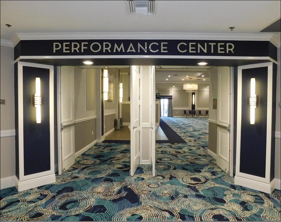 5203 Europa Drive, Unit G Boynton Beach, FL 33437 - Photo 22 of 29 a view of a hallway with wooden floor