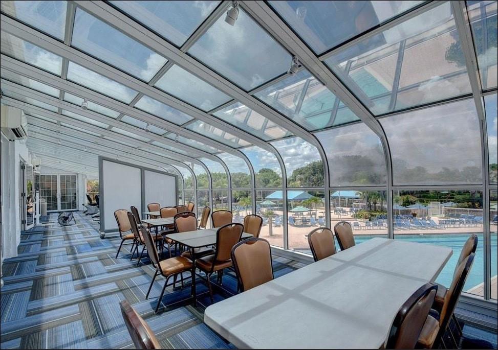 5203 Europa Drive, Unit G Boynton Beach, FL 33437 - Photo 23 of 29 a outdoor space with lots of tables and chairs