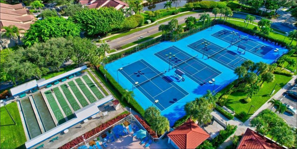 5203 Europa Drive, Unit G Boynton Beach, FL 33437 - Photo 24 of 29 a view of a chairs in the roof deck