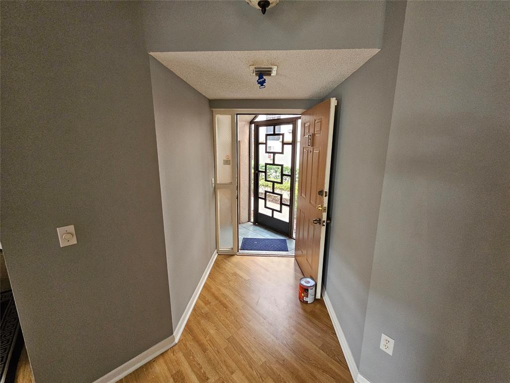 5203 Europa Drive, Unit G Boynton Beach, FL 33437 - Photo 4 of 29 a view of a hallway